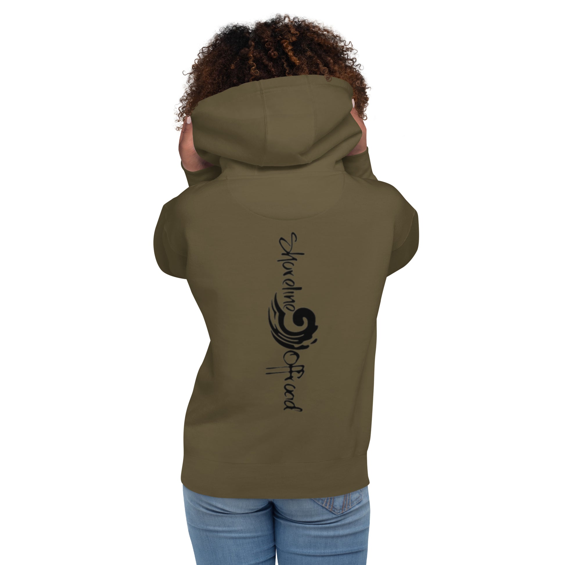 a woman wearing a brown hoodie with a black design on it