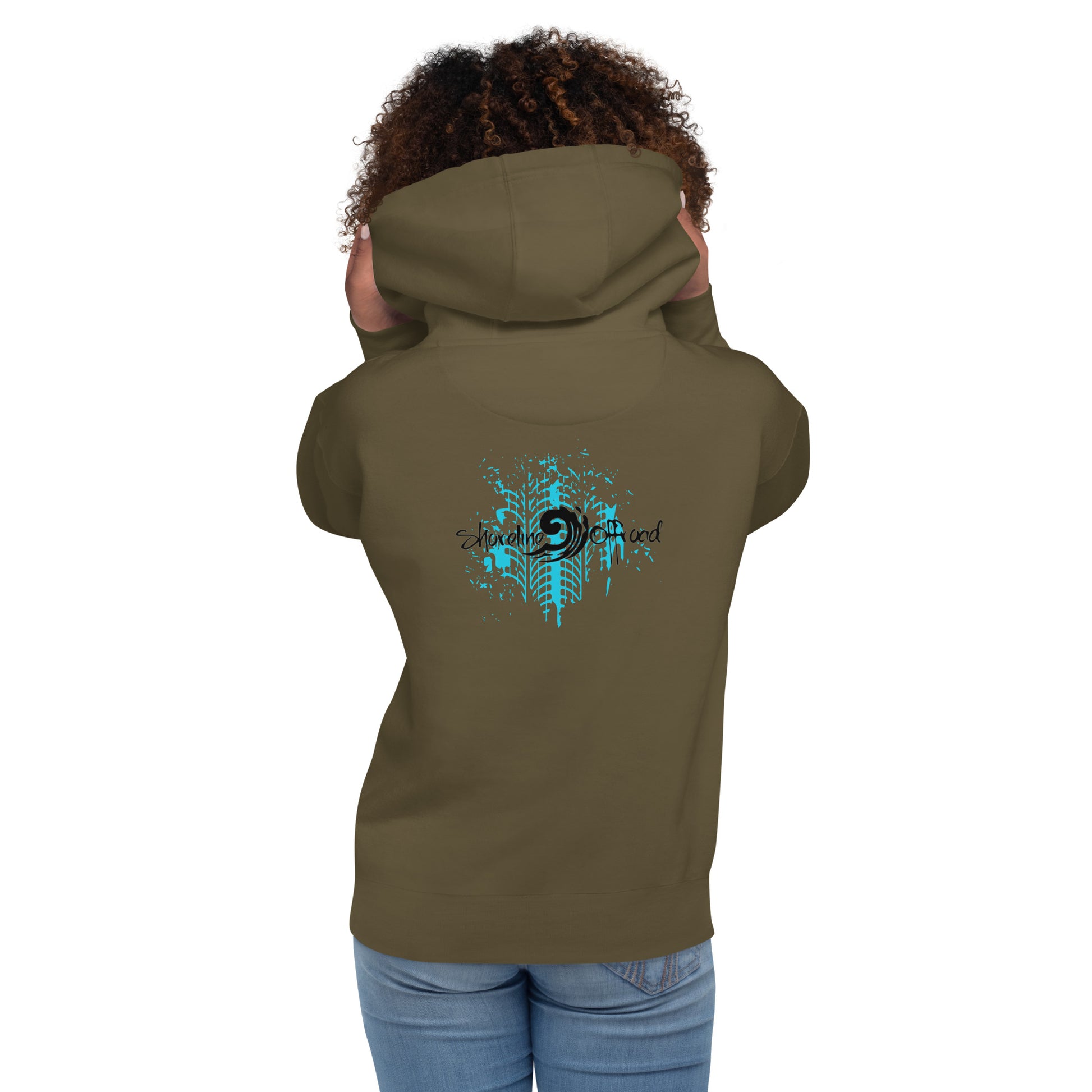 a woman wearing a brown hoodie with a blue design on it