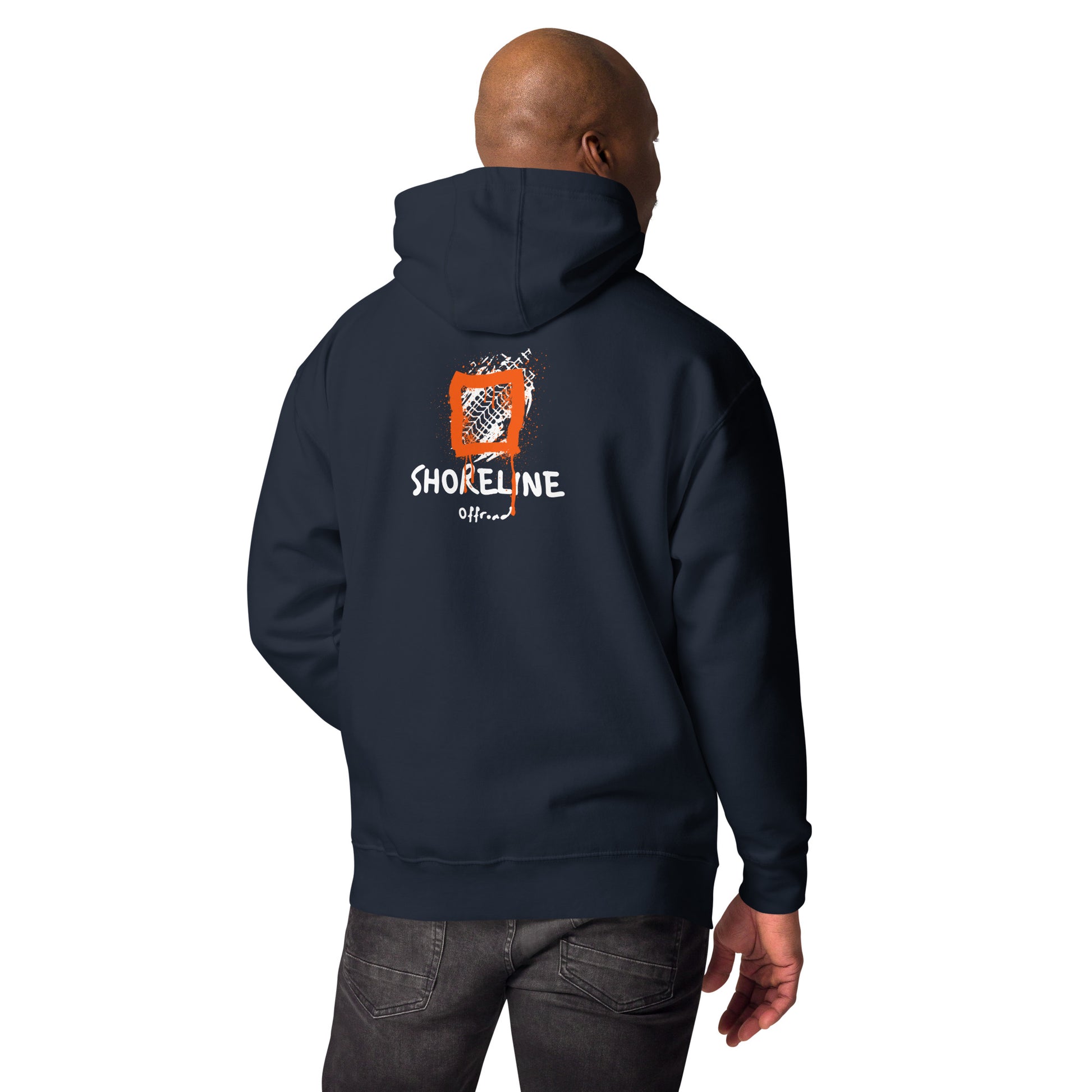 a man wearing a hoodie with the words shoreline on it