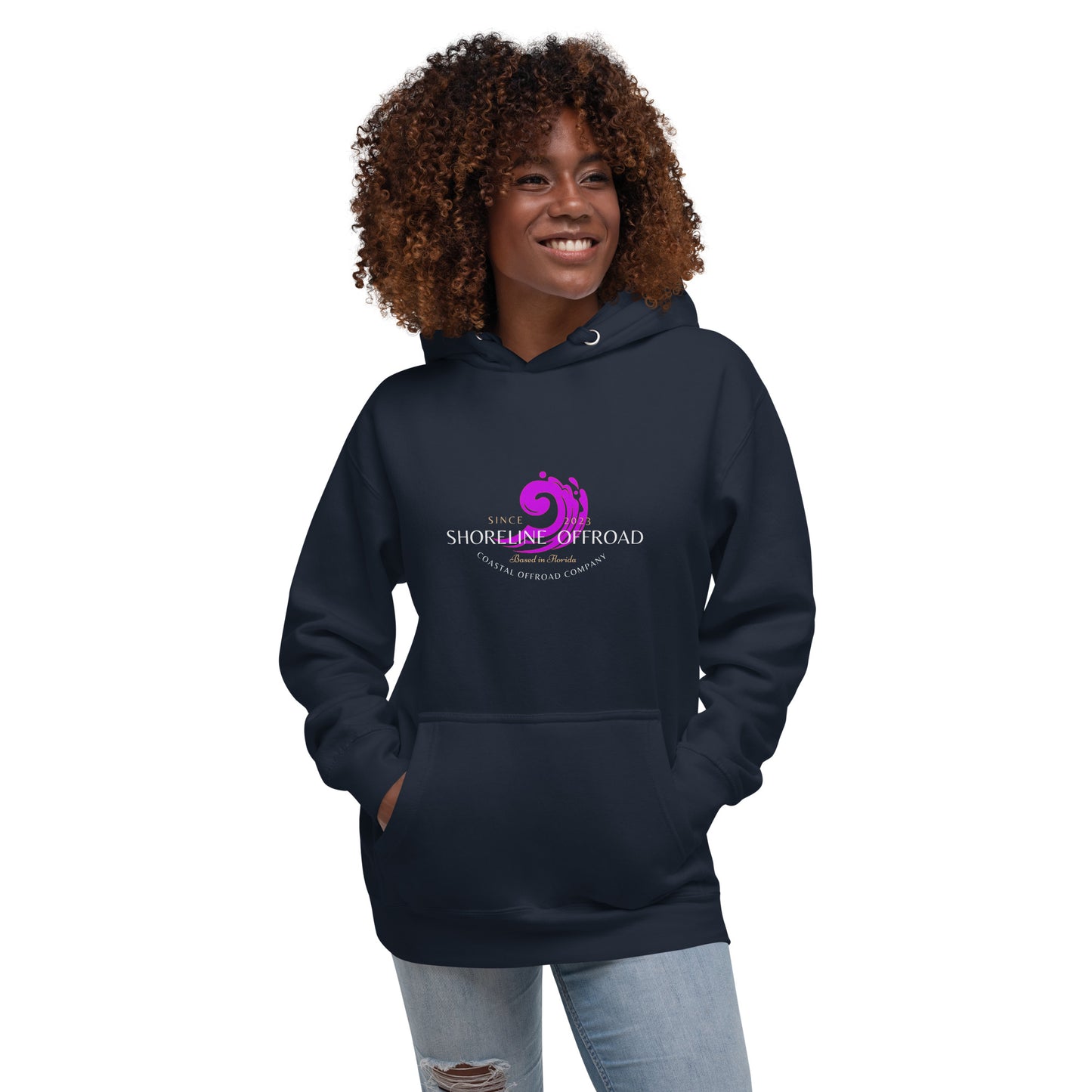 a woman wearing a black hoodie with a purple logo