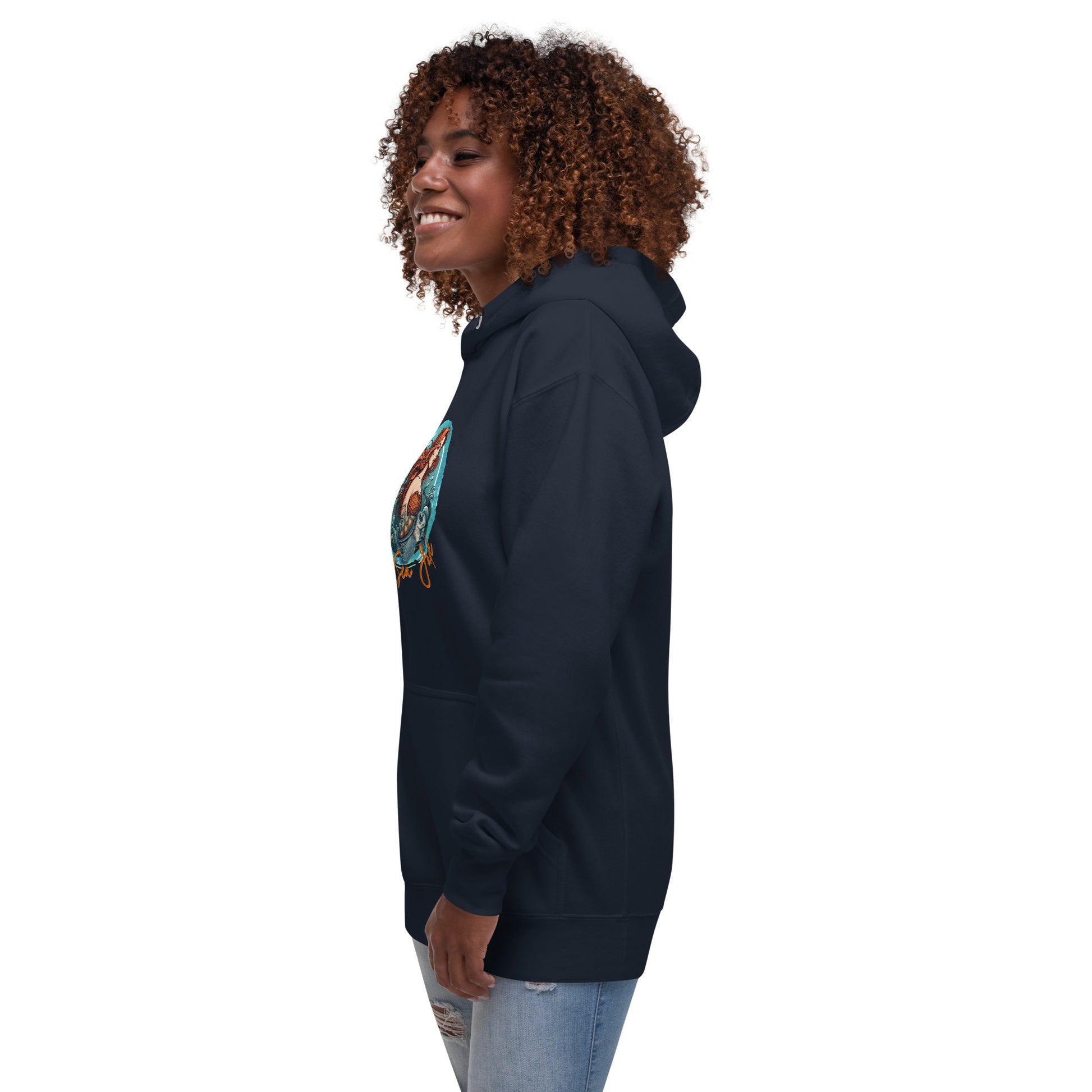 a woman with curly hair wearing a blue hoodie