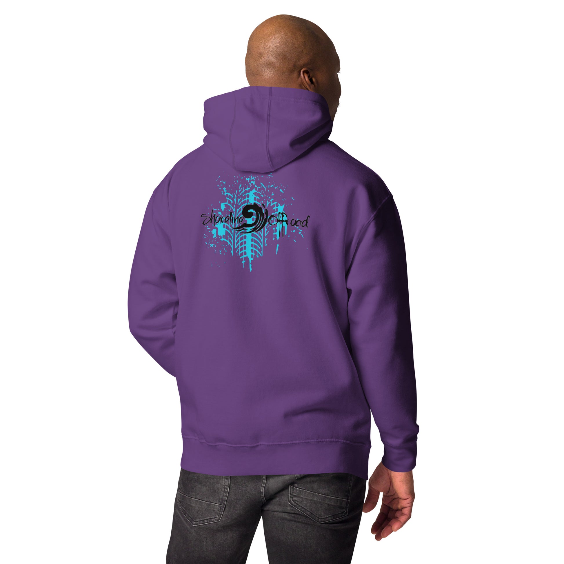 a man wearing a purple hoodie with a blue design on it