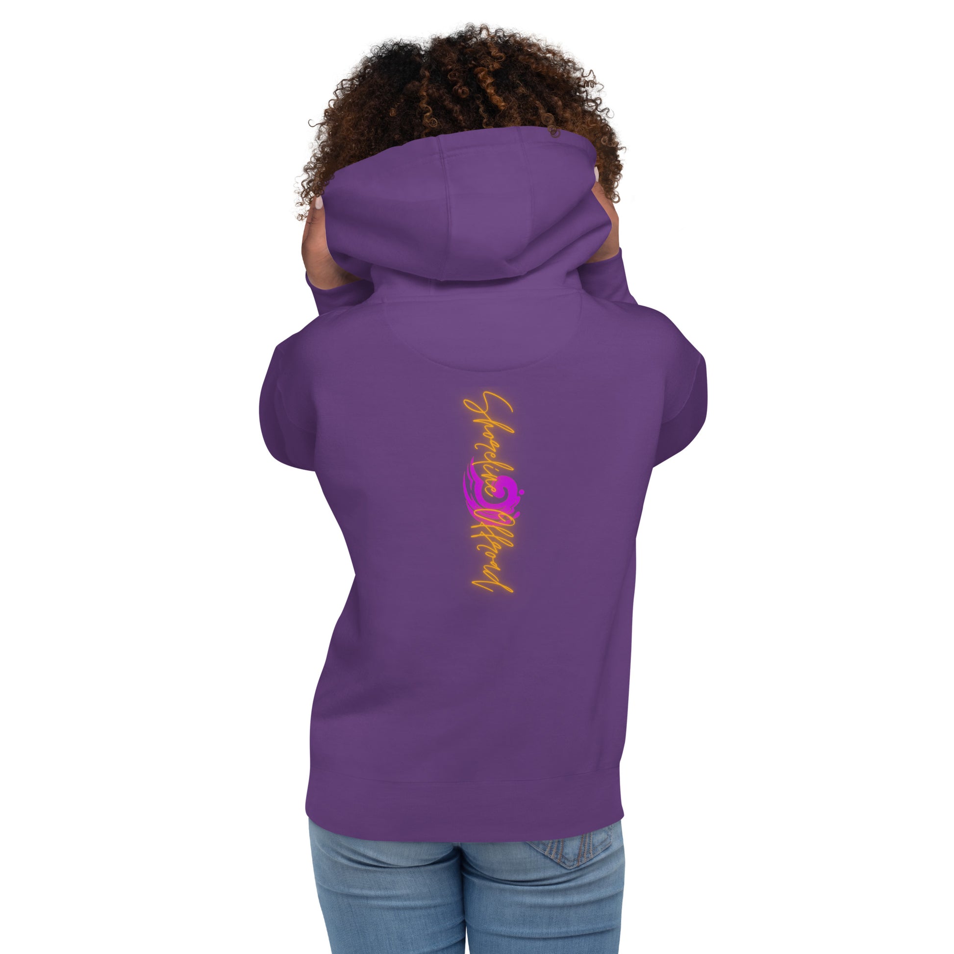 a woman wearing a purple hoodie with a dragon on it