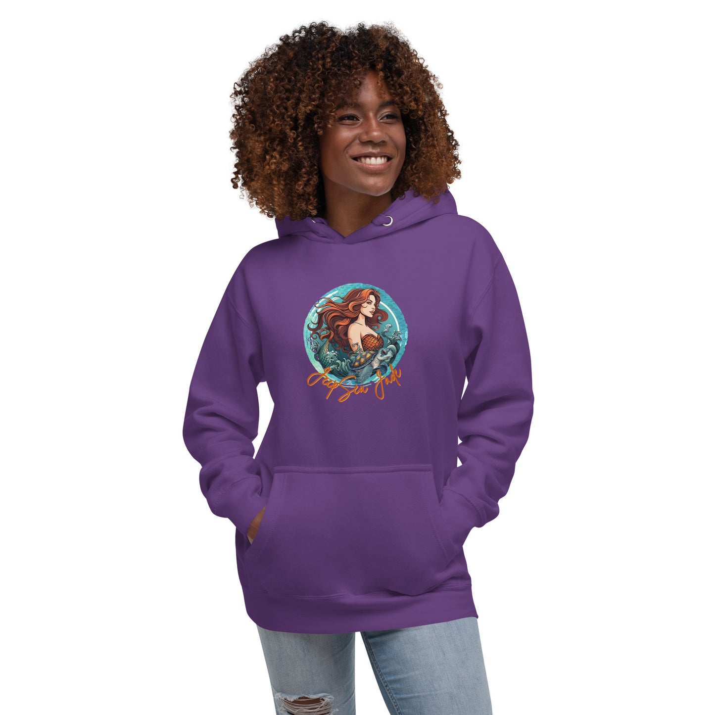 a woman wearing a purple hoodie with a picture of a mermaid on it