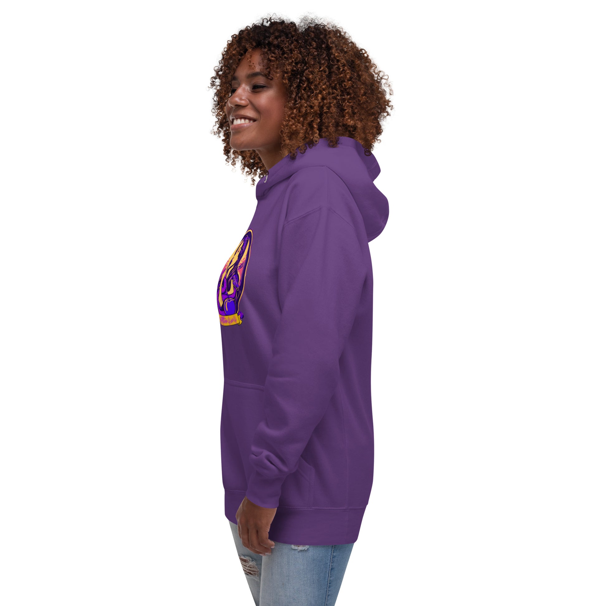 a woman wearing a purple hoodie with a gold and purple design