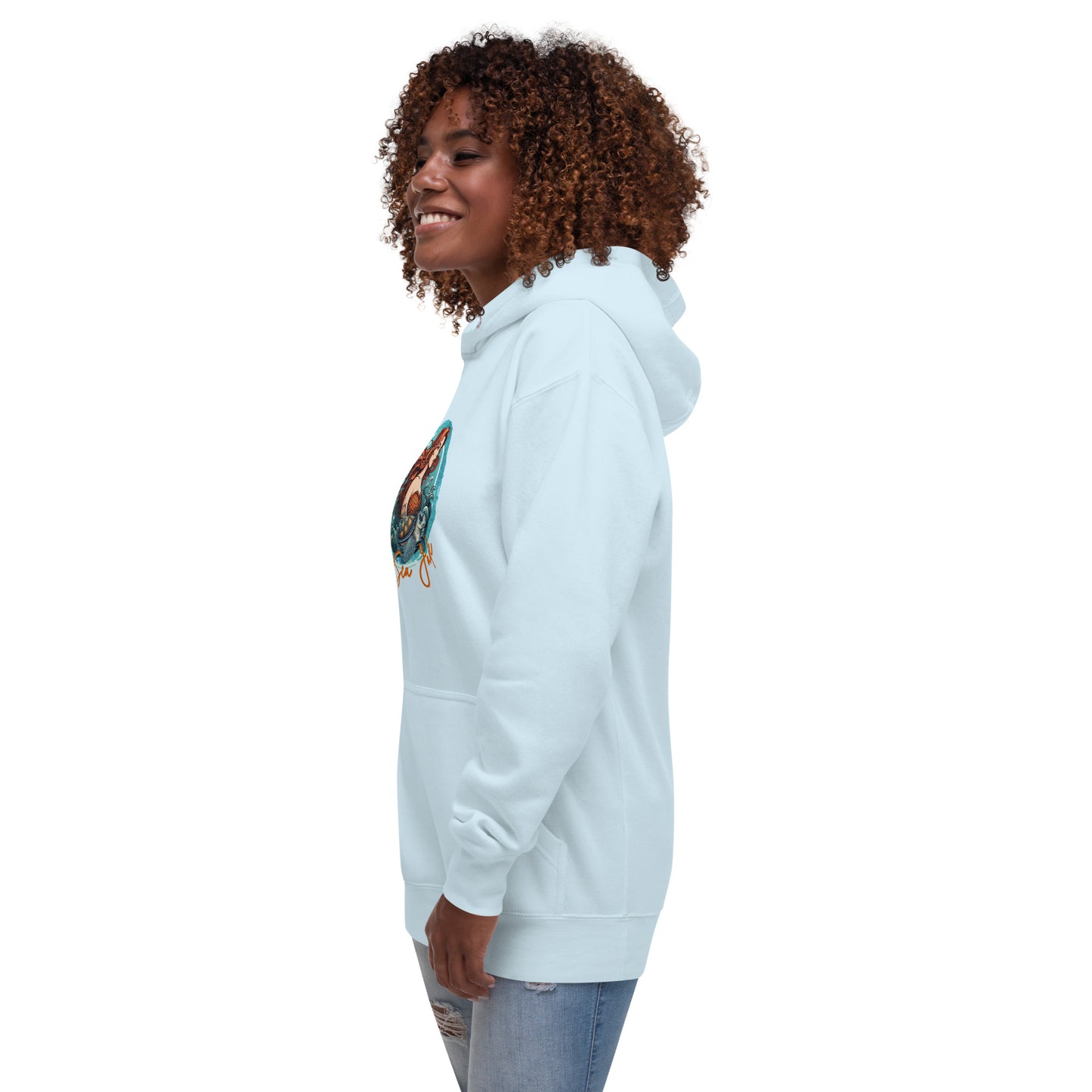 a woman wearing a white sweatshirt and jeans