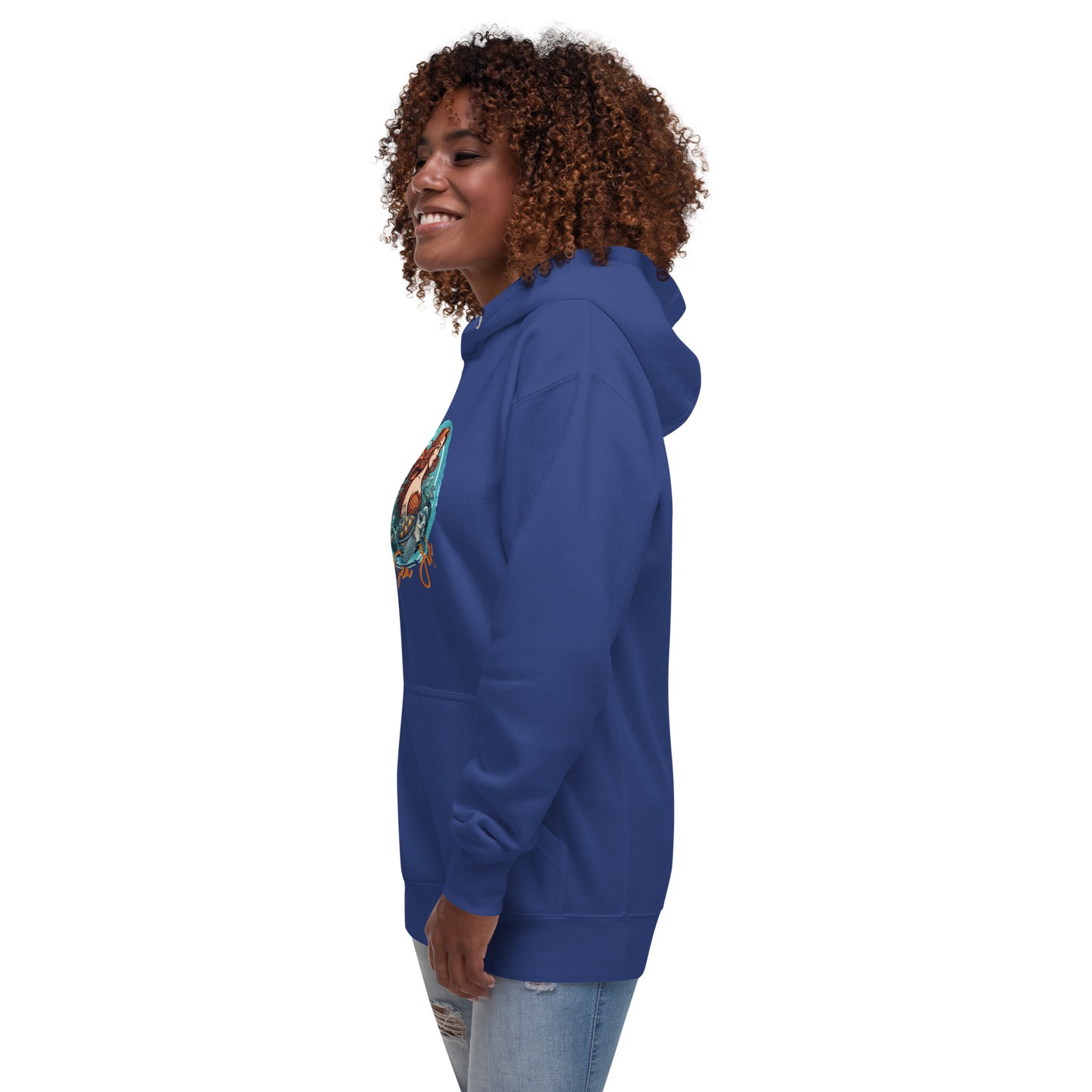 a woman wearing a blue hoodie with a colorful design on it