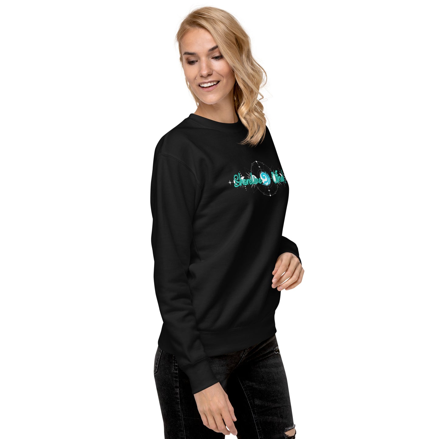 a woman wearing a black sweatshirt with a green logo