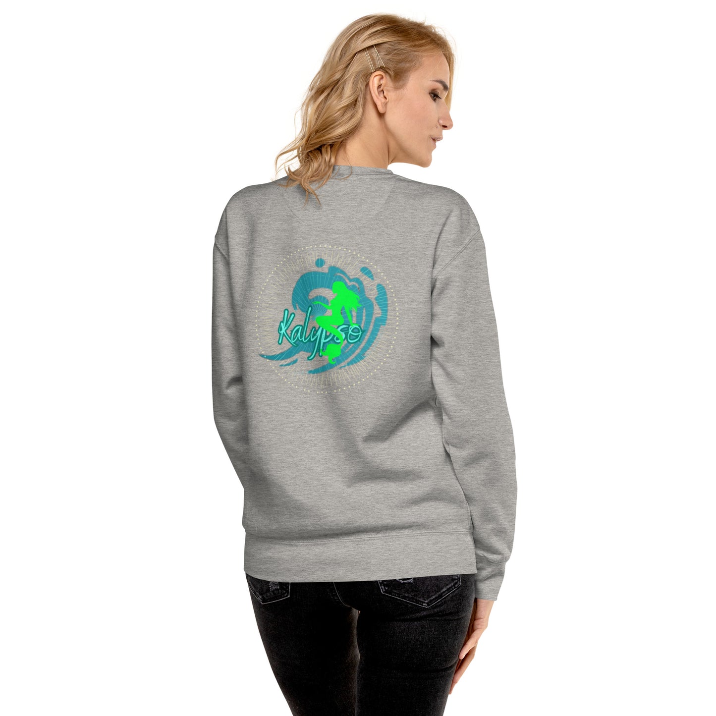 a woman wearing a grey sweatshirt with a green turtle on it