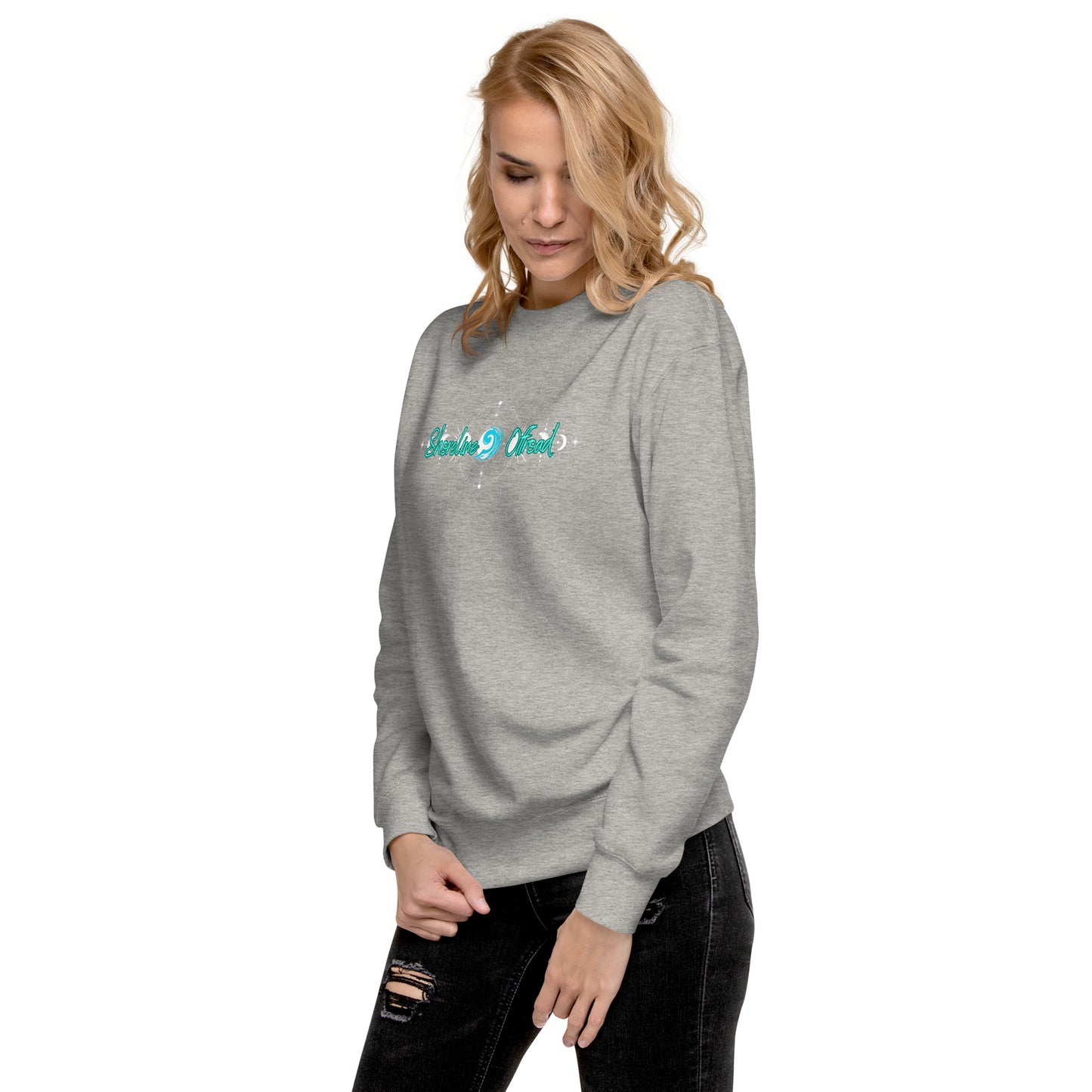 a woman wearing a grey sweatshirt with the word love on it