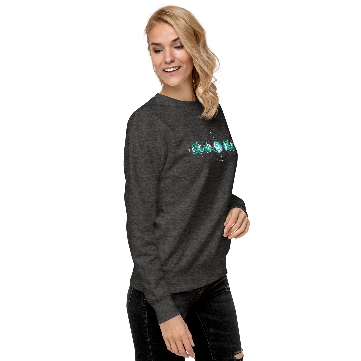 a woman wearing a black sweatshirt with the word mom on it