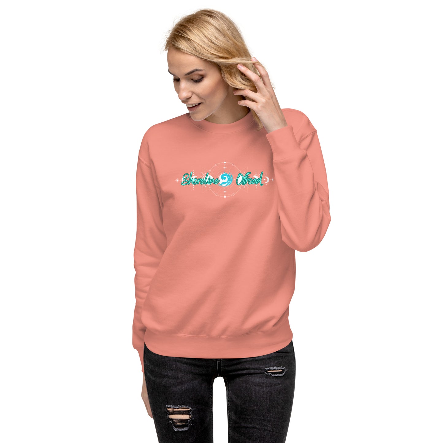 a woman wearing a pink sweatshirt with the word love on it