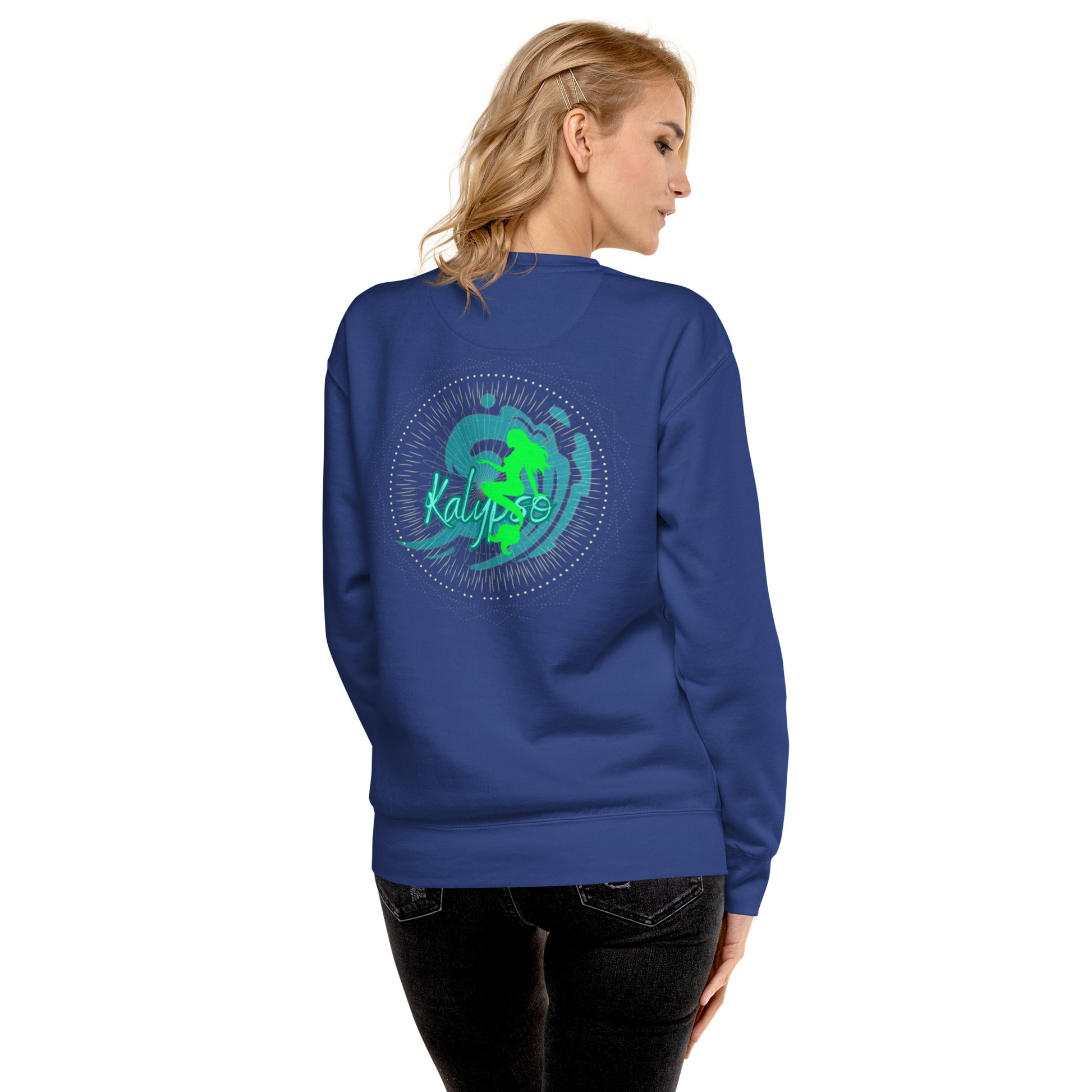 a woman wearing a blue sweatshirt with a green turtle on it