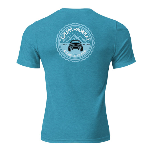 a blue t - shirt with a truck and mountains in the background