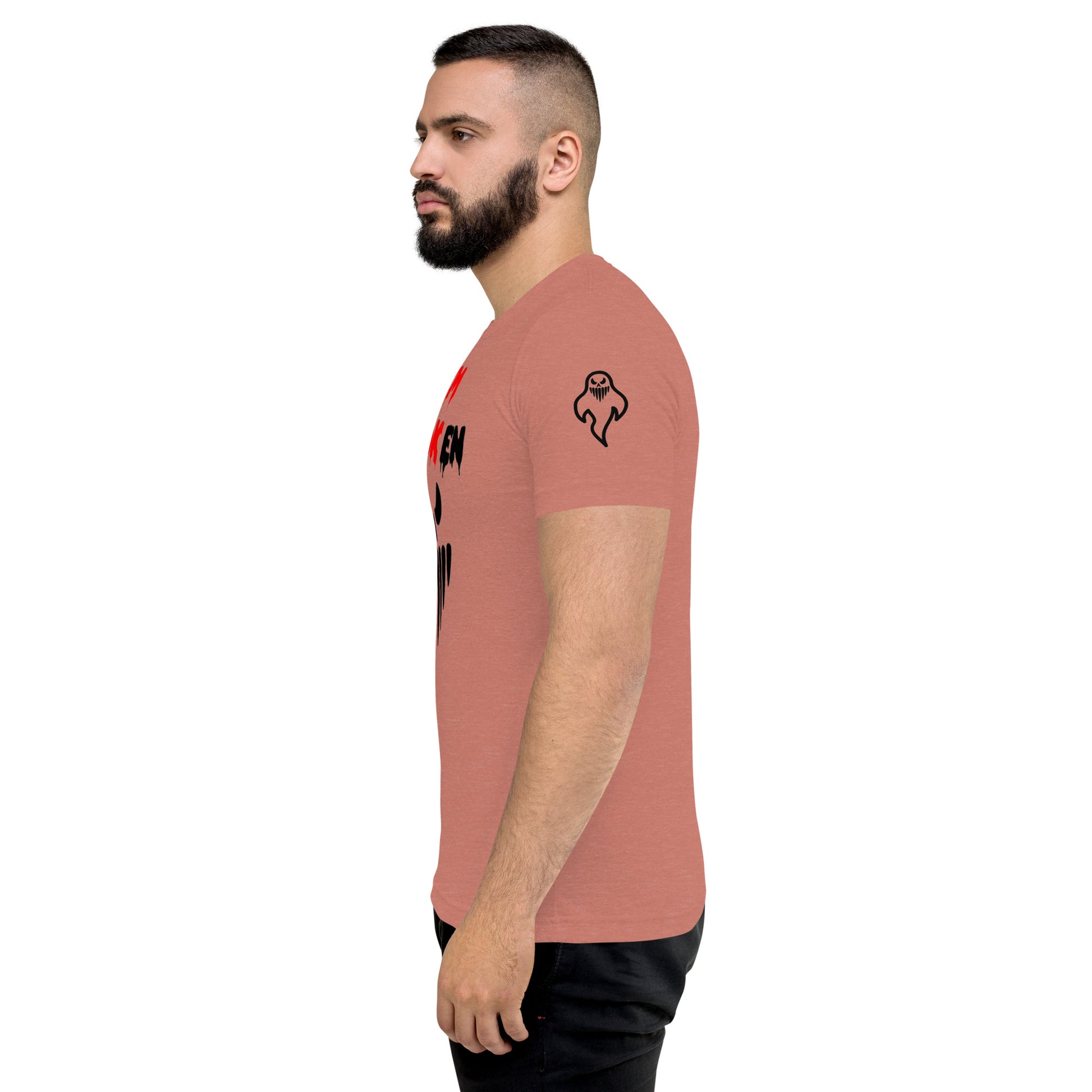 a man with a beard wearing a pink t - shirt