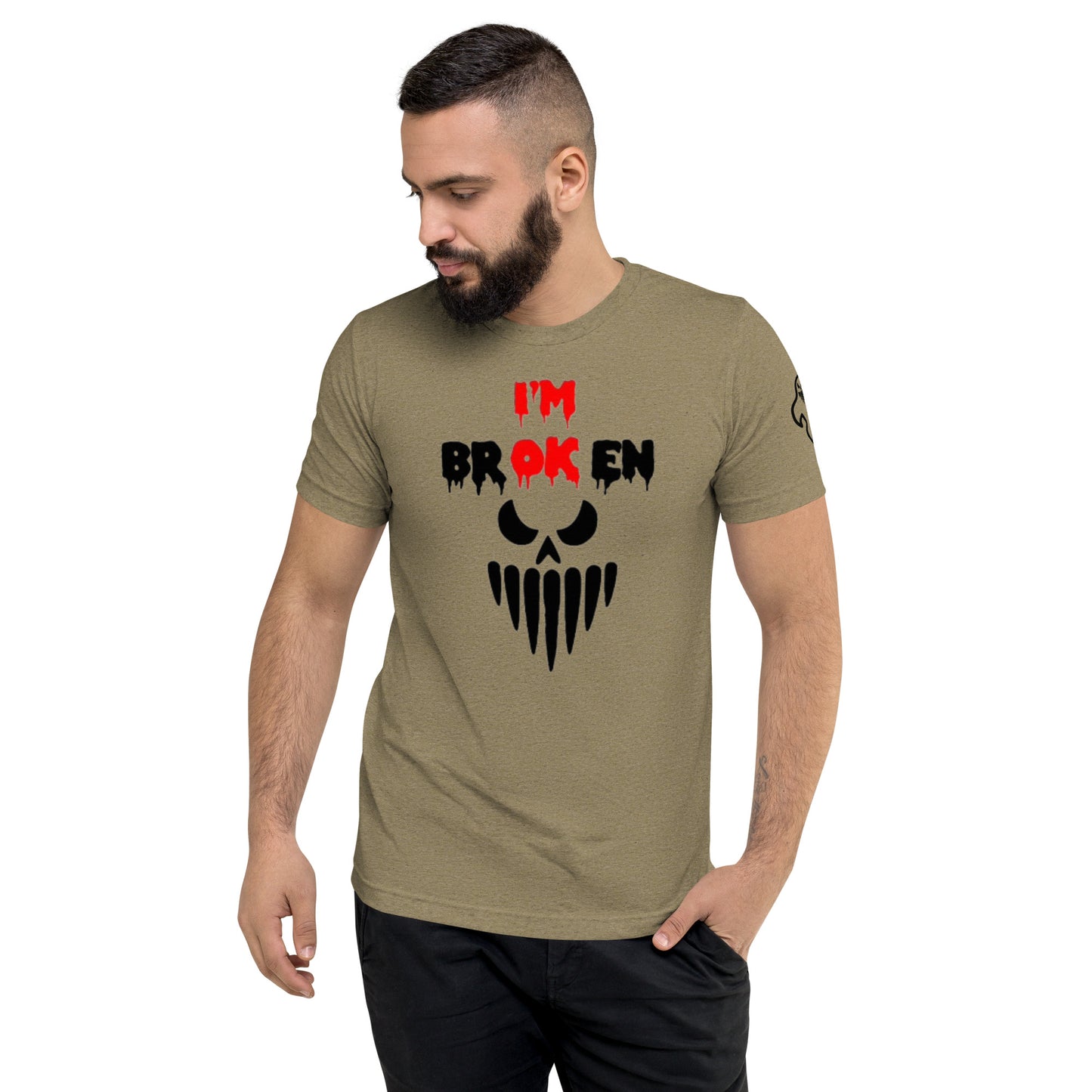 a man wearing a t - shirt with a skull on it