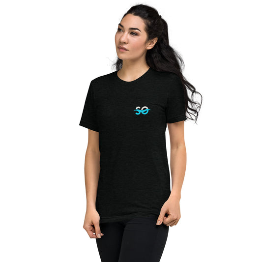 a woman wearing a black t - shirt with the word so on it