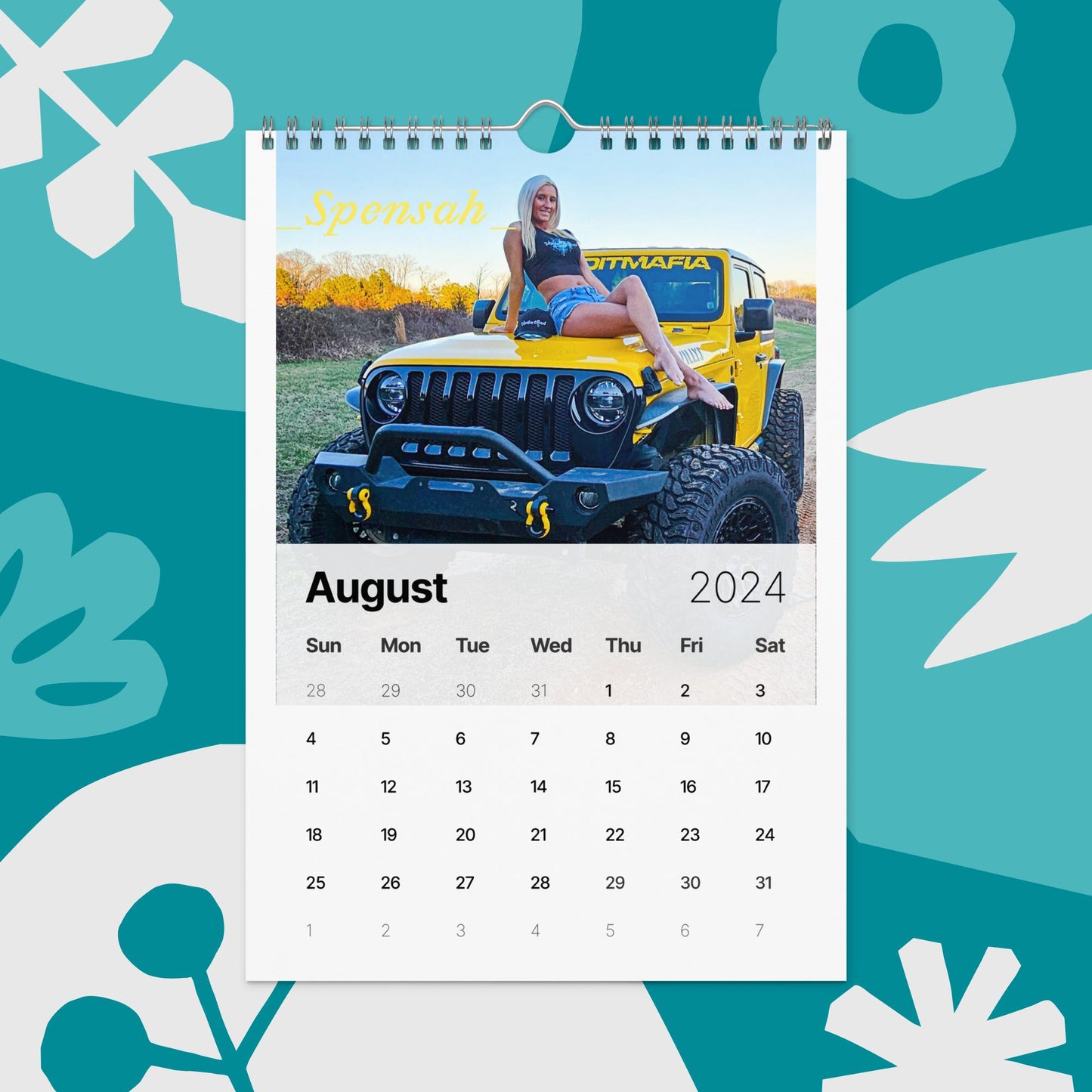 a calendar with a photo of a woman on a jeep