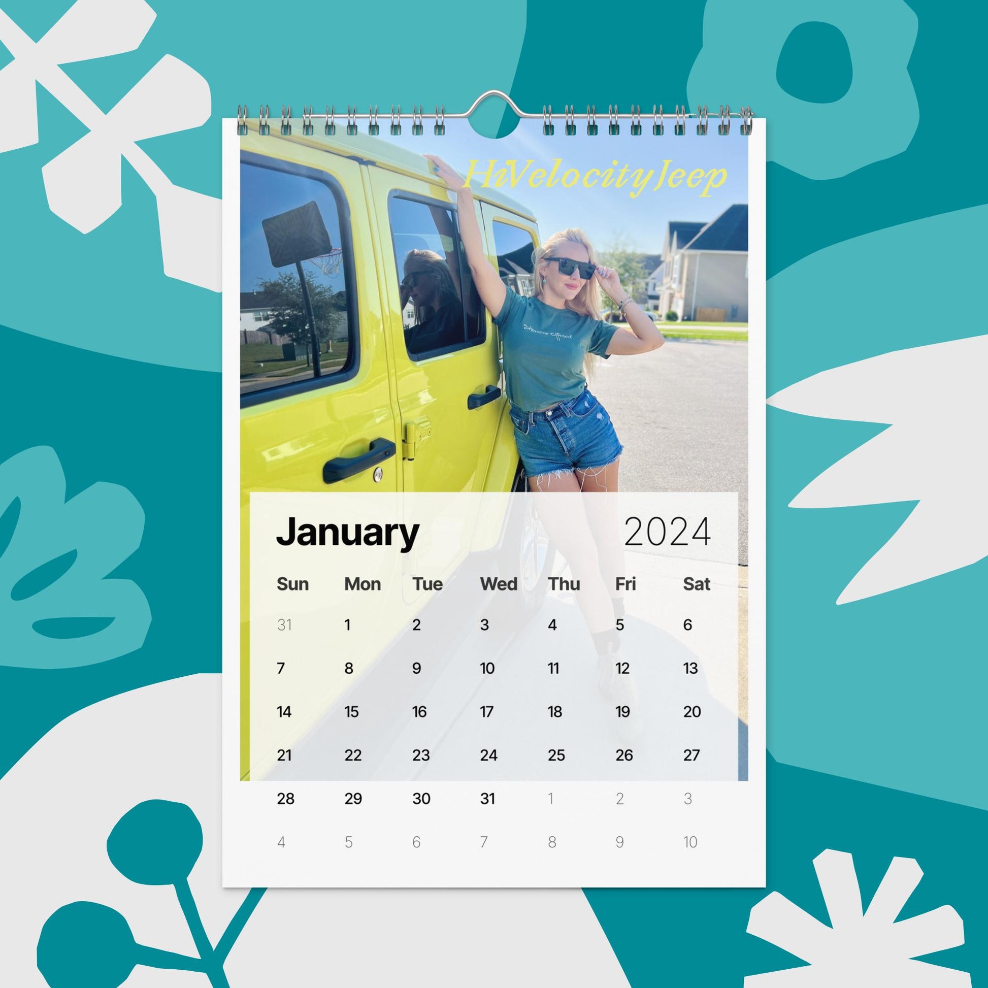 a calendar with a photo of a woman leaning out of a yellow truck