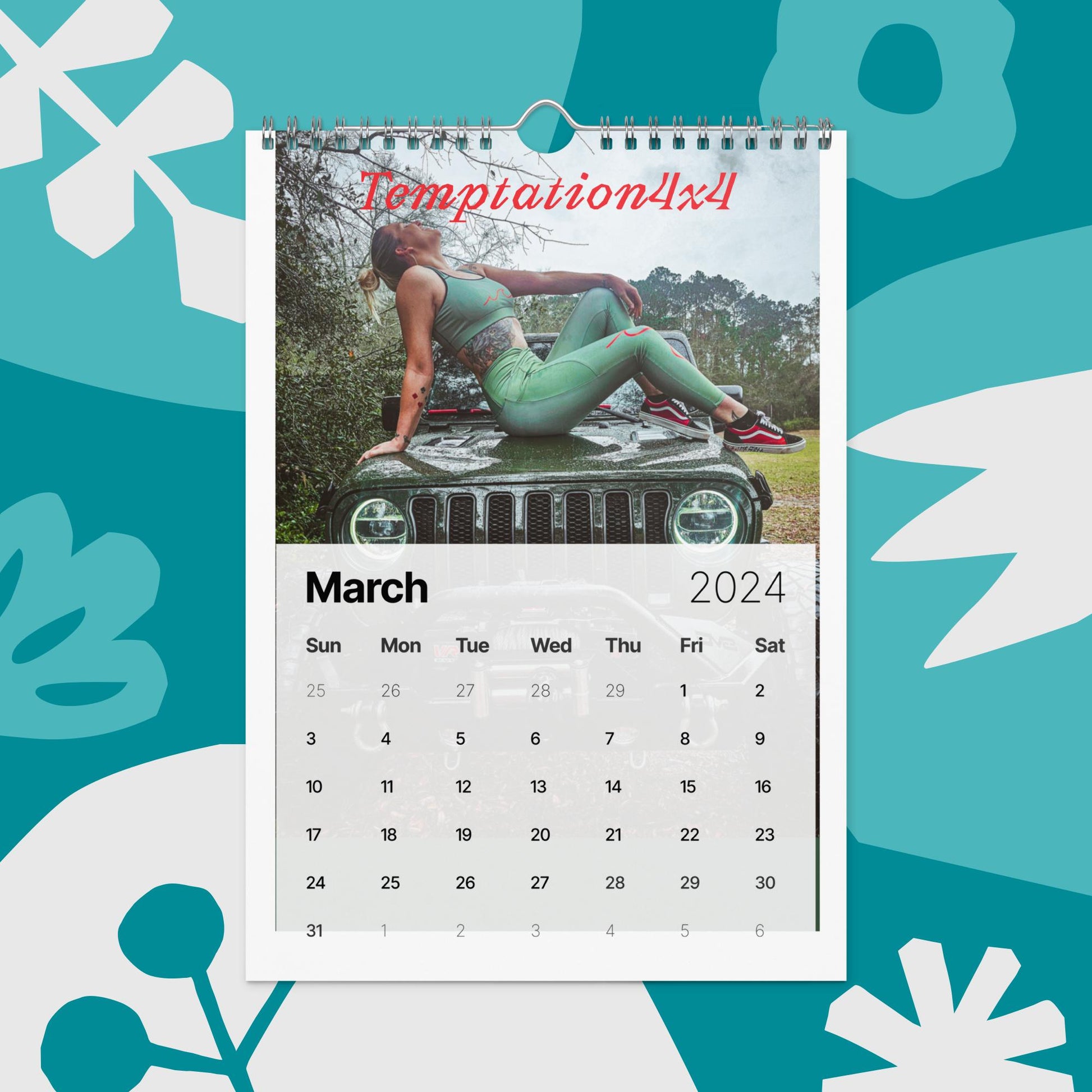 a calendar with a photo of a woman on a jeep