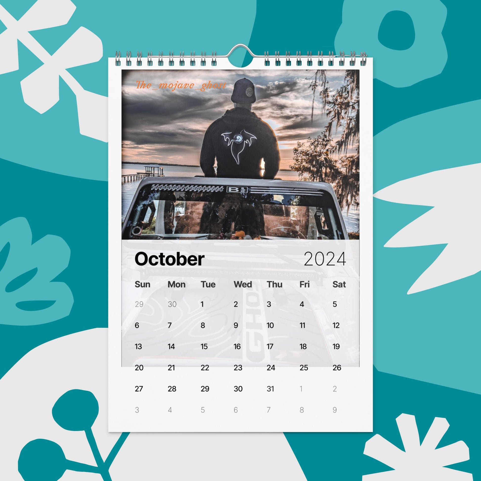 a calendar with a photo of a man in a hoodie