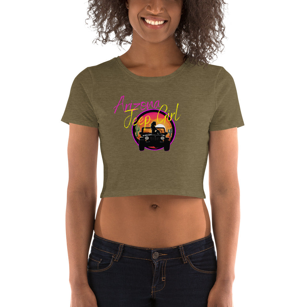 a woman wearing a crop top with a truck on it