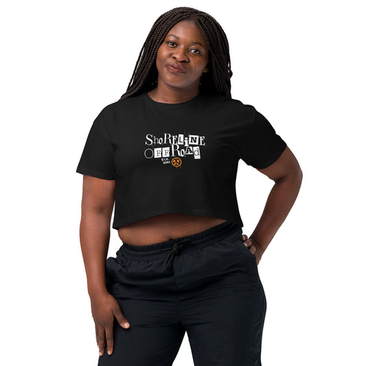 a woman wearing a black shirt with the word survivor on it