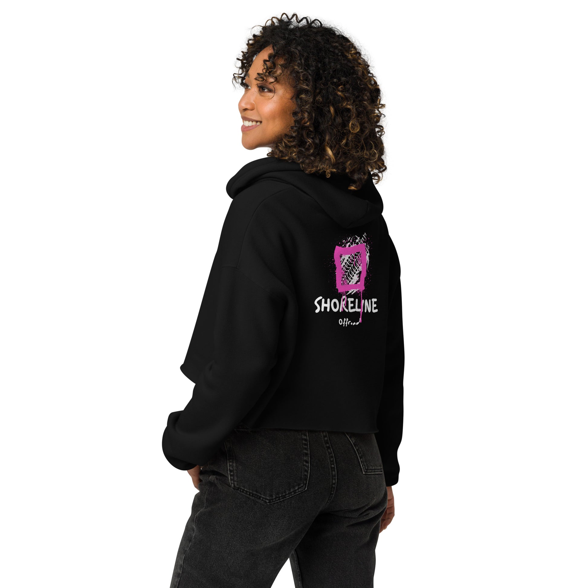 a woman wearing a black hoodie with the word shoeline on it