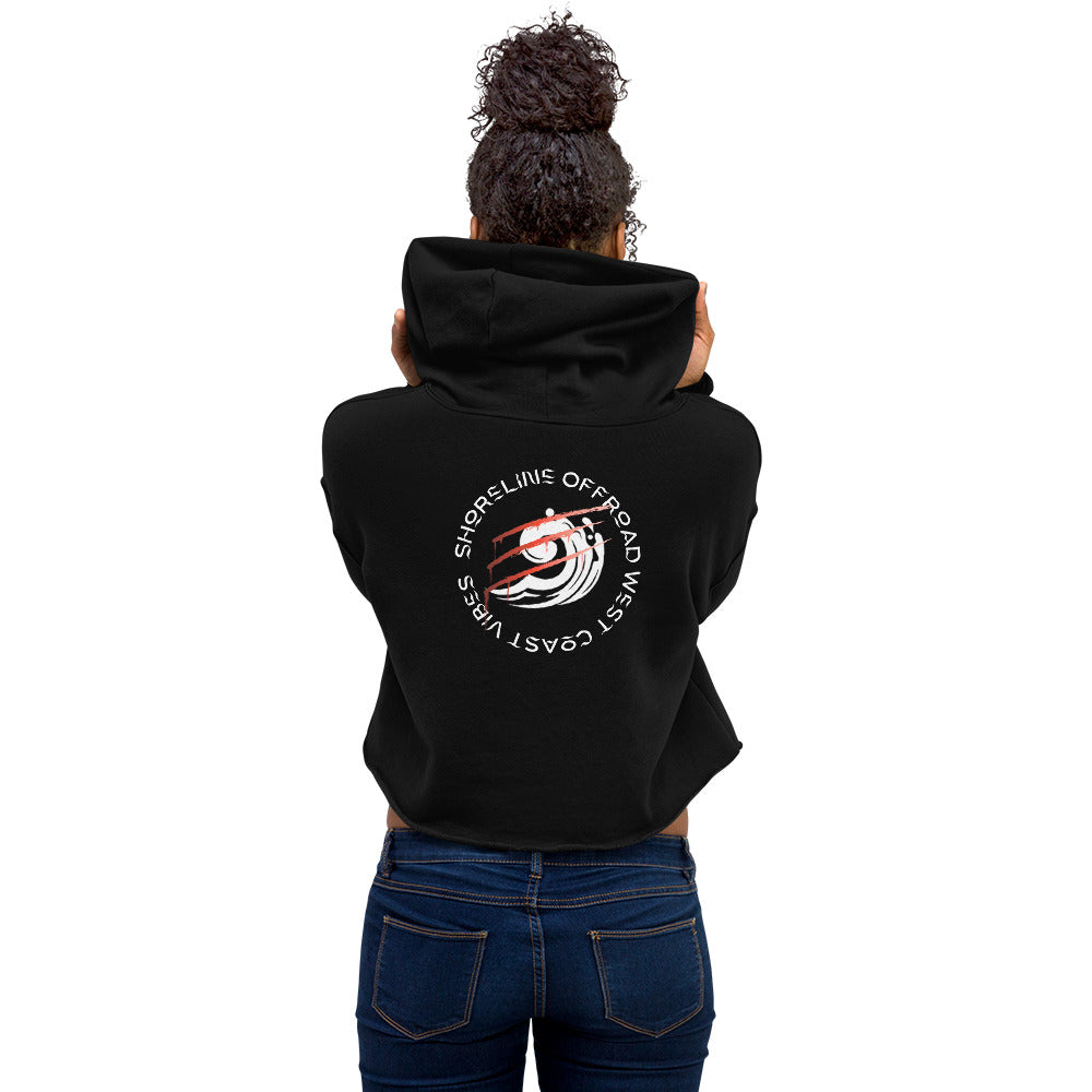 the back of a woman wearing a black hoodie