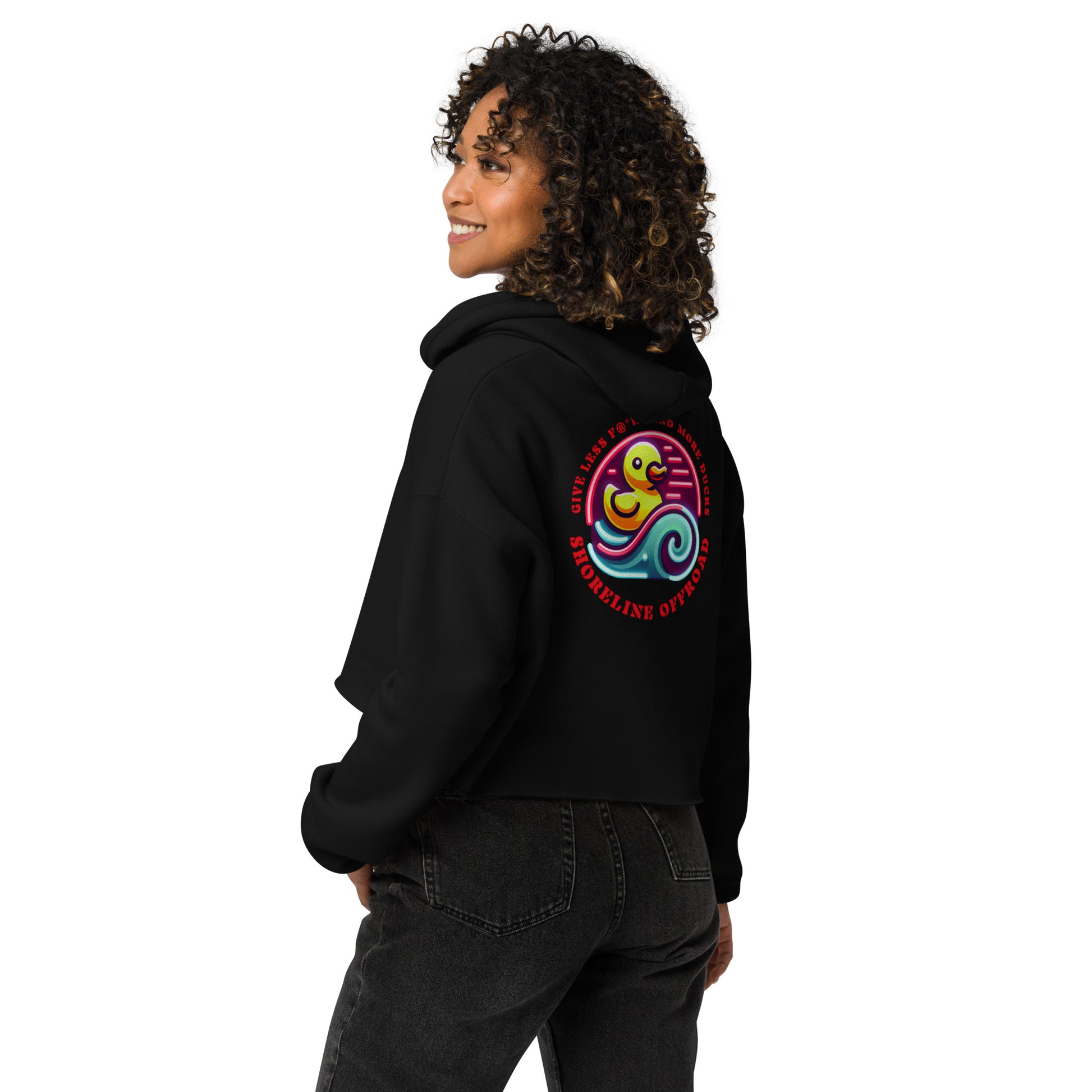 a woman wearing a black hoodie with a colorful design on it