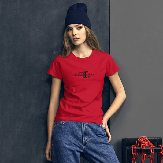 a woman wearing a red shirt and a black beanie