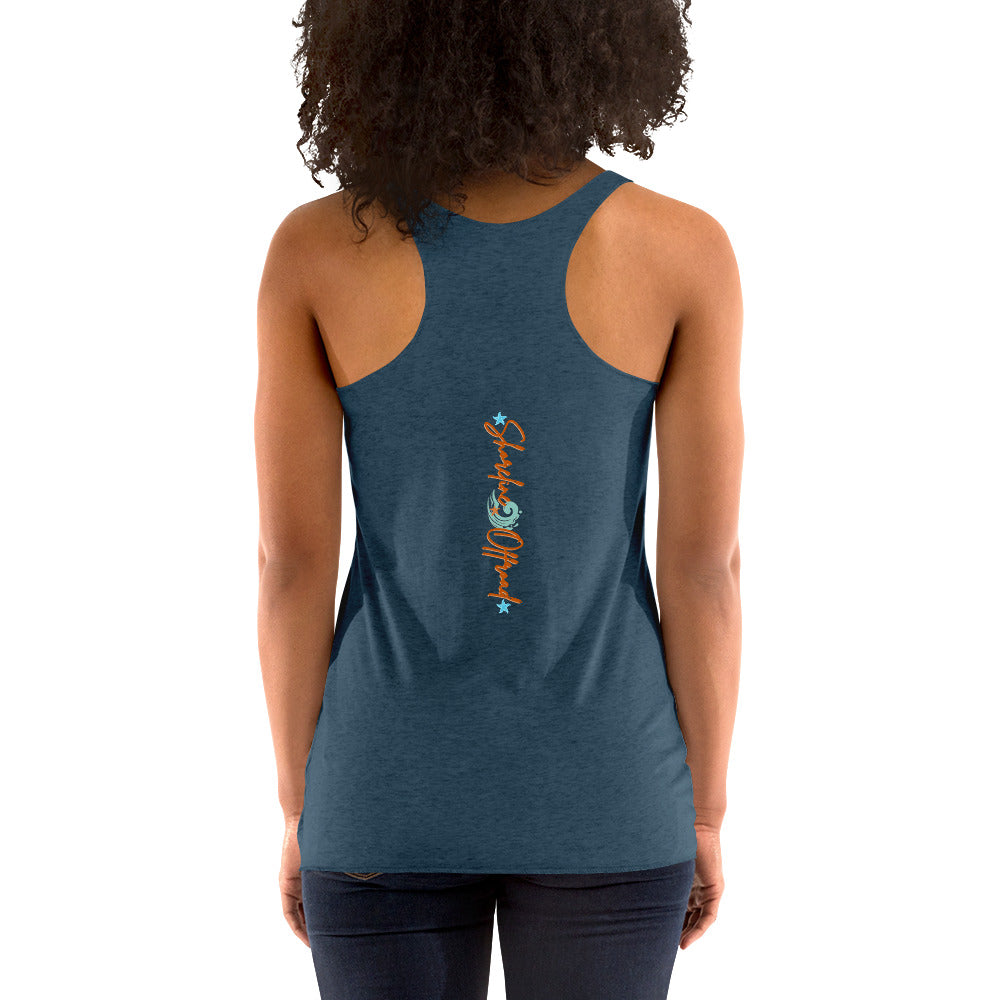 a woman wearing a blue tank top with a fish on it