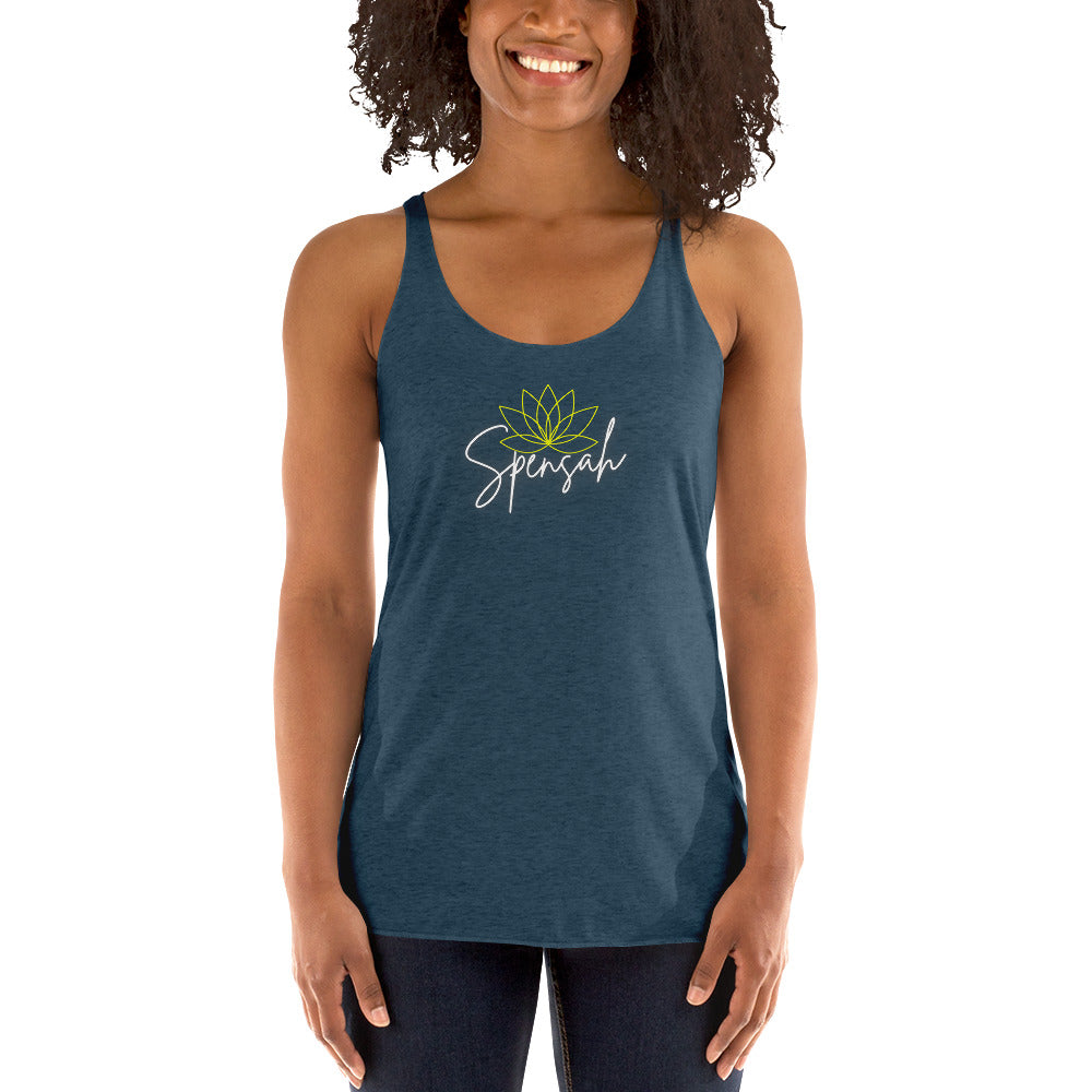 a woman wearing a blue tank top with a green flower on it