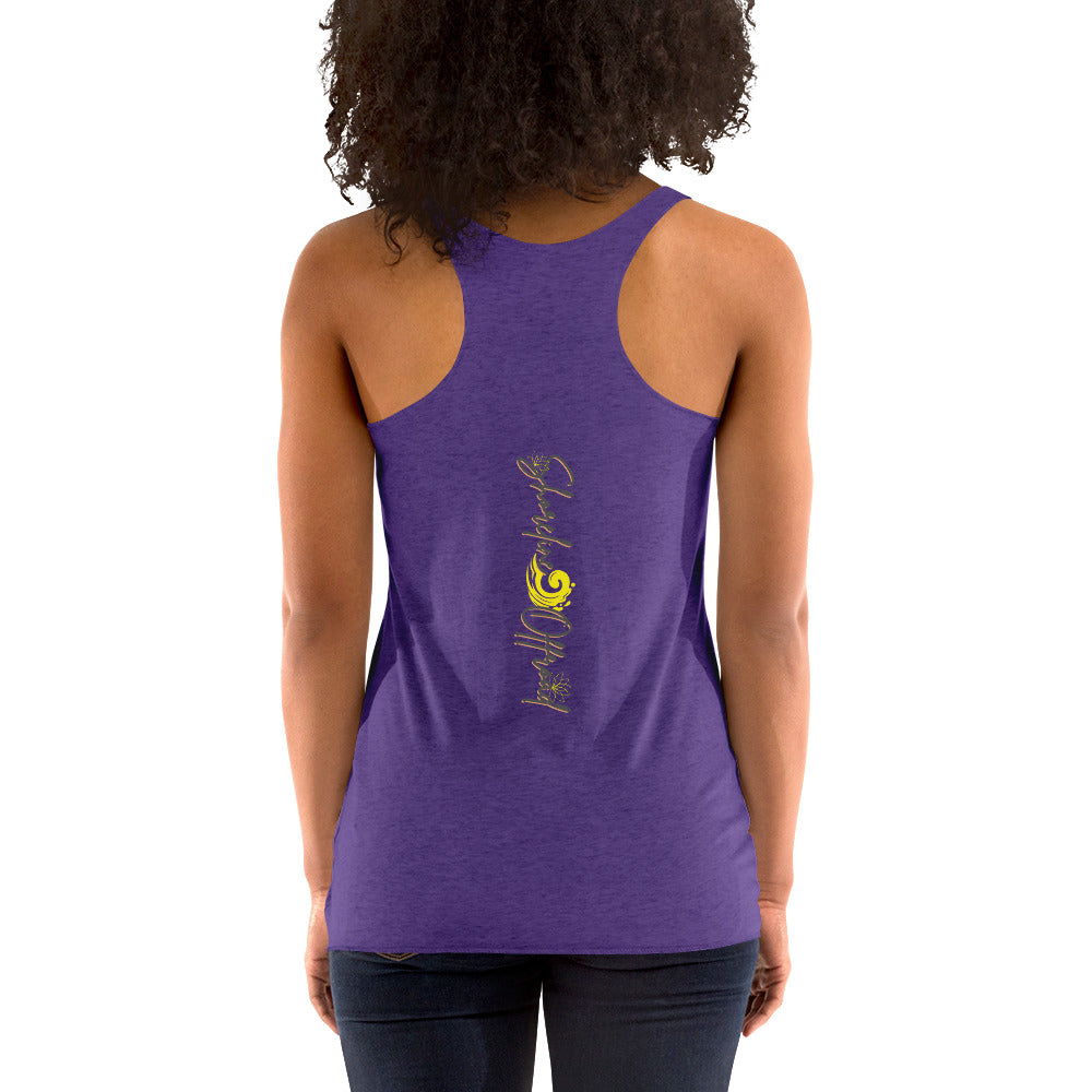 a woman wearing a purple tank top with a smiley face on it