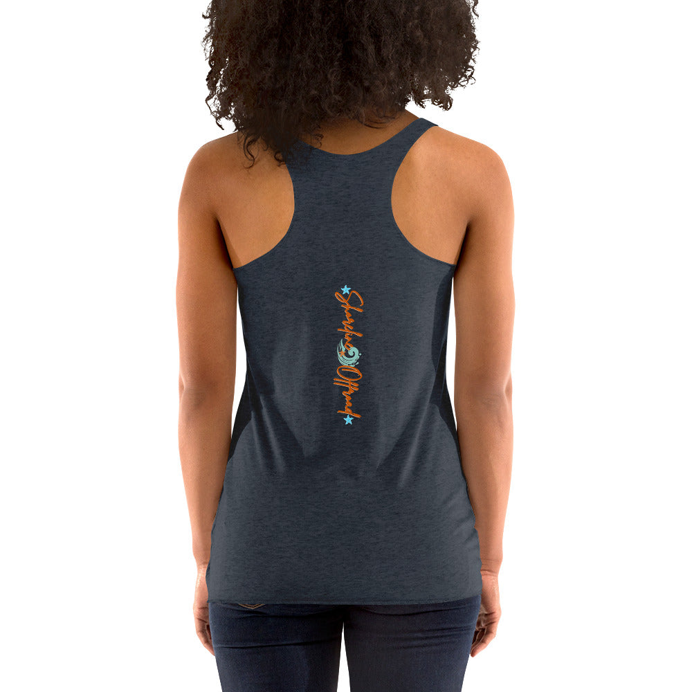 a woman wearing a tank top with a fish on it