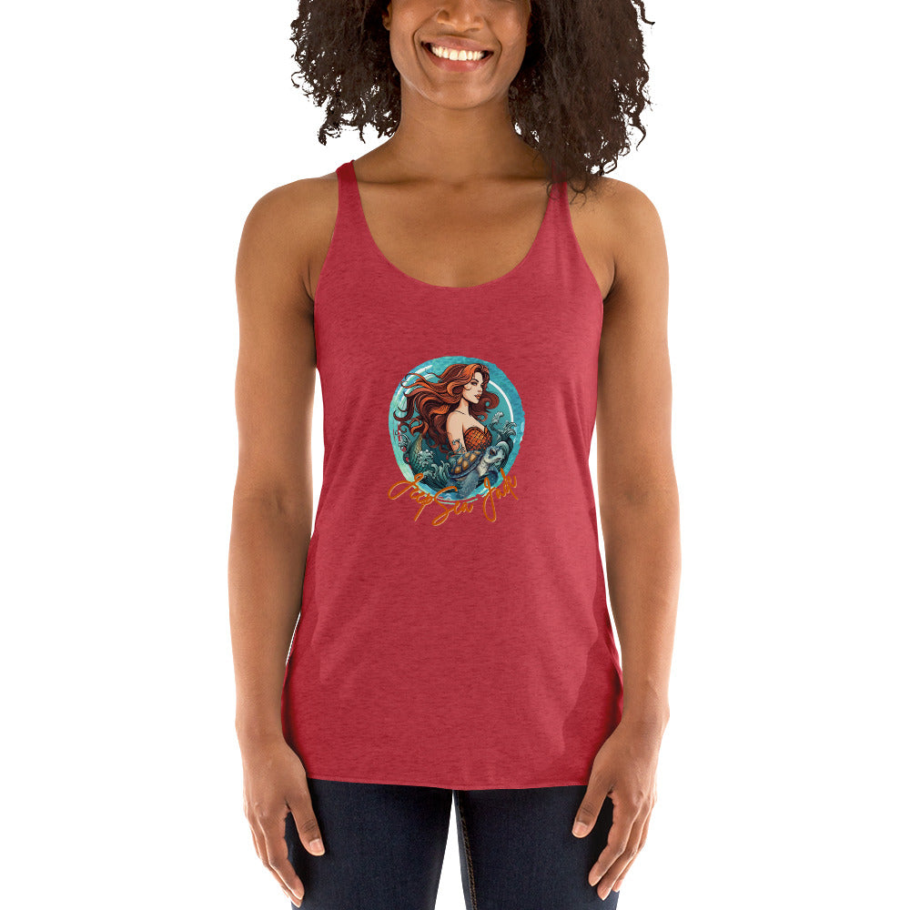 a woman wearing a red tank top with a picture of a mermaid