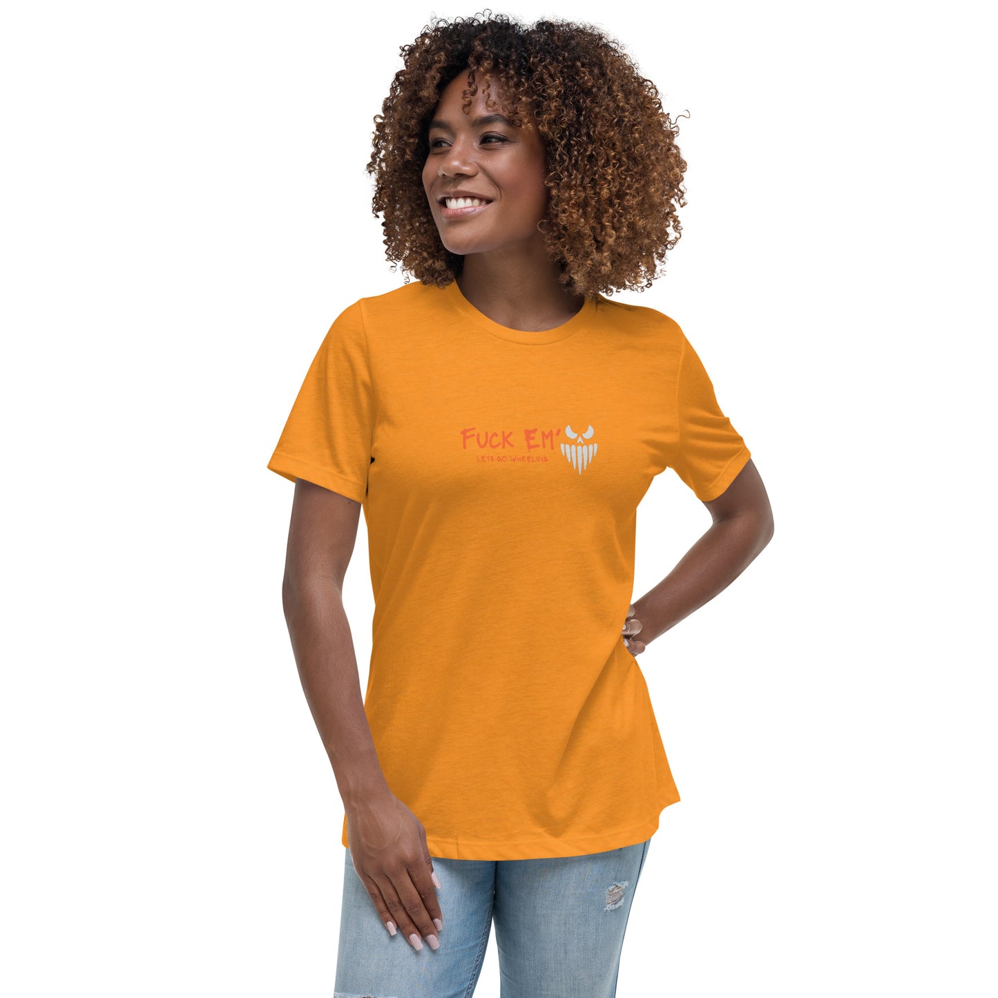 a woman wearing an orange t - shirt with an owl on it