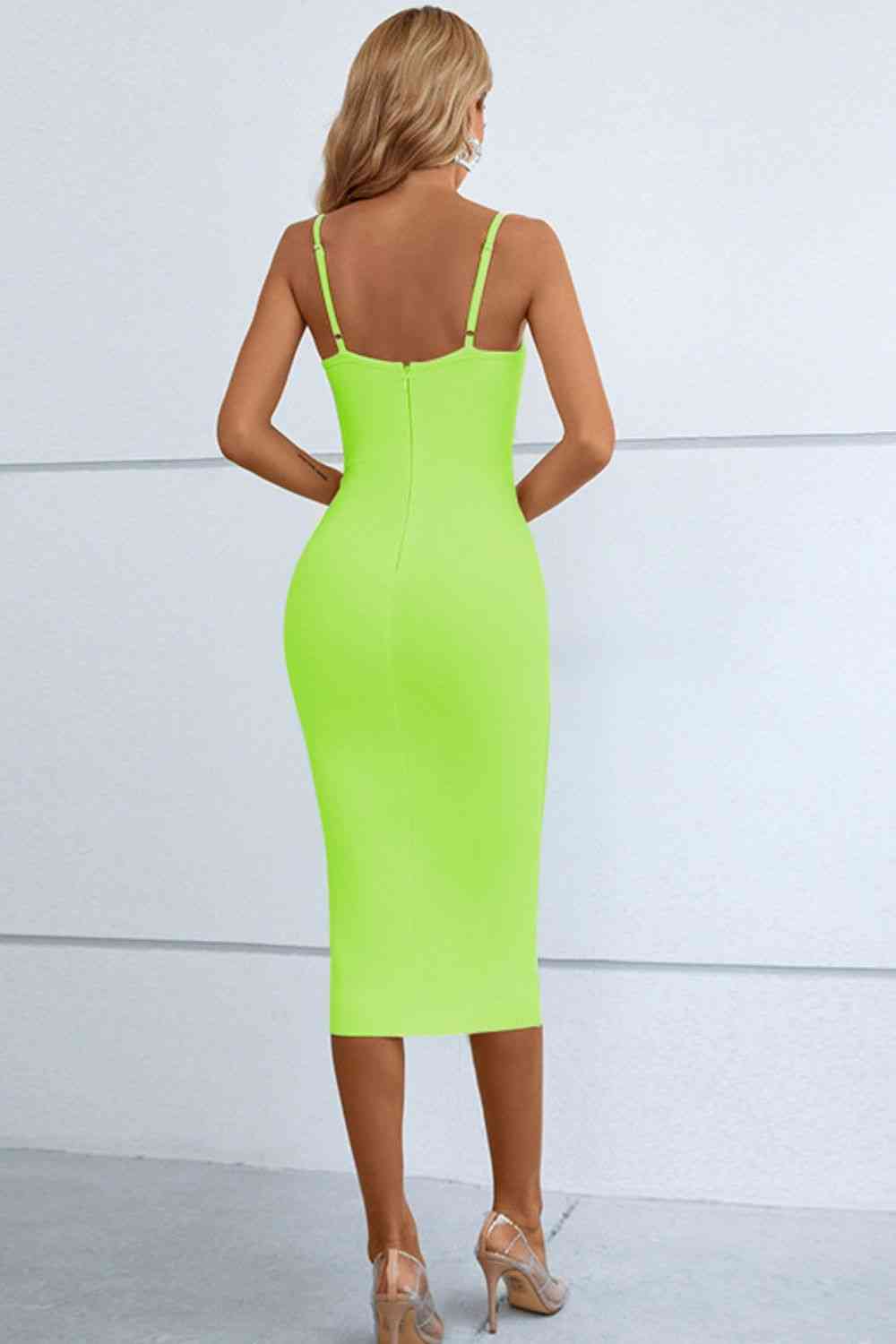a woman in a neon green dress