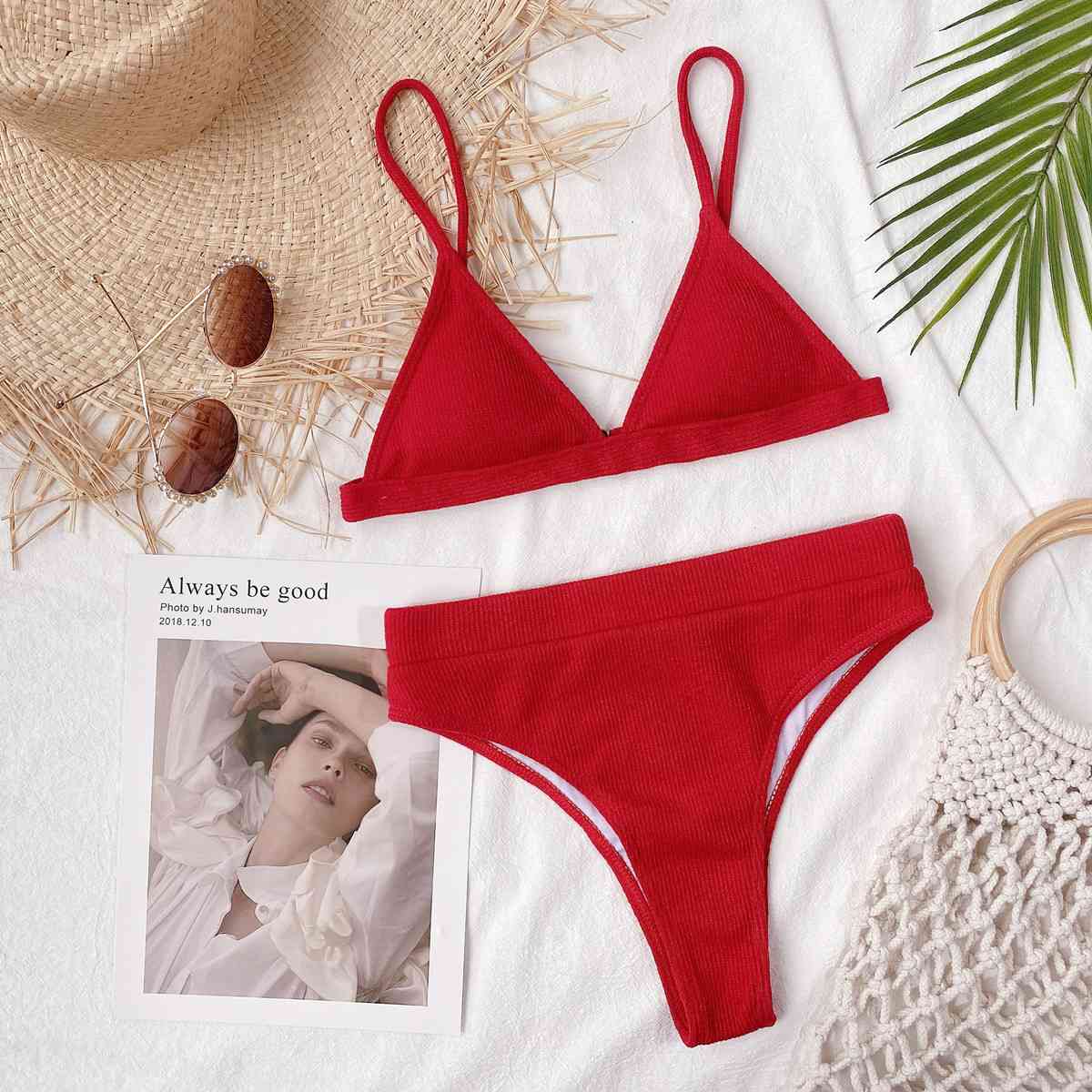 a red bikinisuit with a picture of a woman