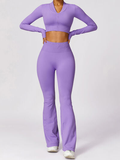 a woman in a purple sports suit with her hands on her hips