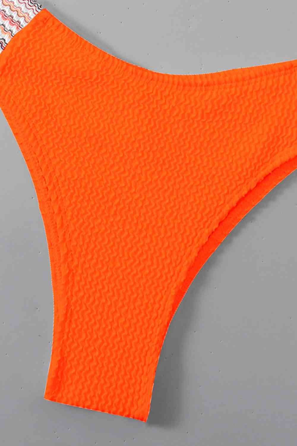 a close up of an orange piece of cloth