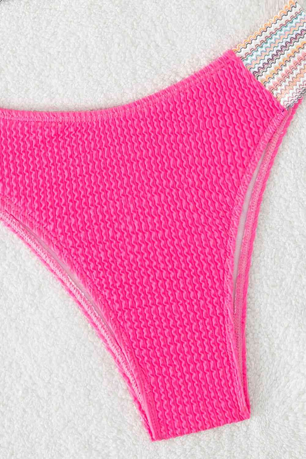 a close up of a pink bikini bottom