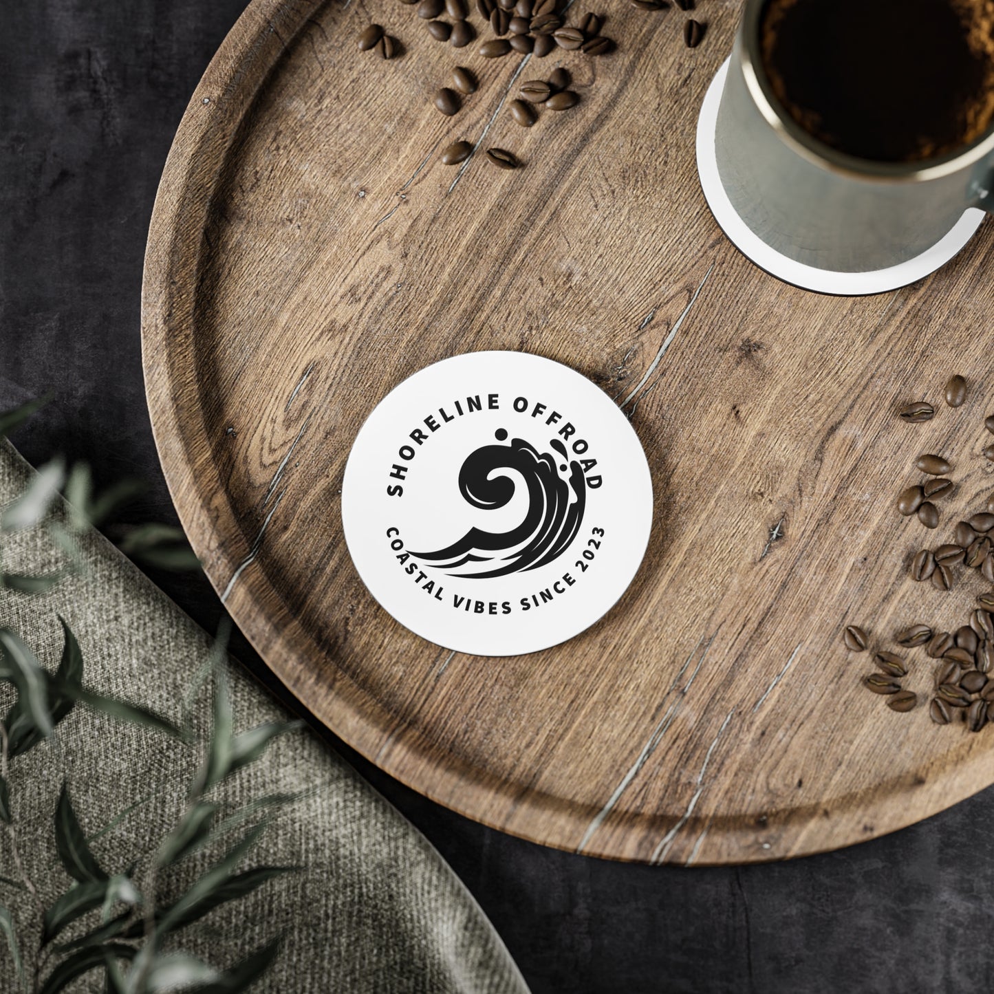 a wooden tray topped with a cup of coffee